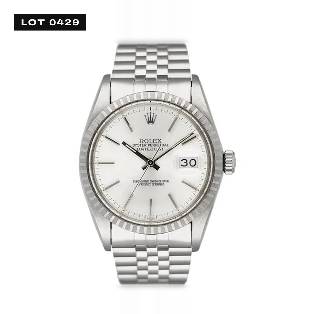 Drawing of a steel wristwatch with a fluted bezel, date window and three-link bracelet.